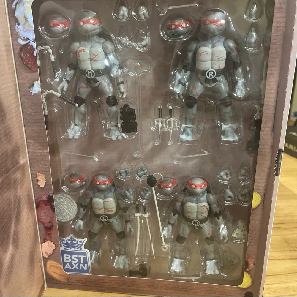 TMNT Turtles Battle Damage BST AXN Figures 4-Pack Pizza box Grey NEW